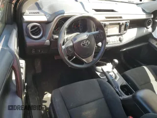 2018 Toyota RAV4 XLE with VIN 2T3WFREVXJW471443, listed as a Copart auction lot 54890655 with 131,677 mi miles and Salvage title. Bid and sale history available at DreamBid. Image 8.