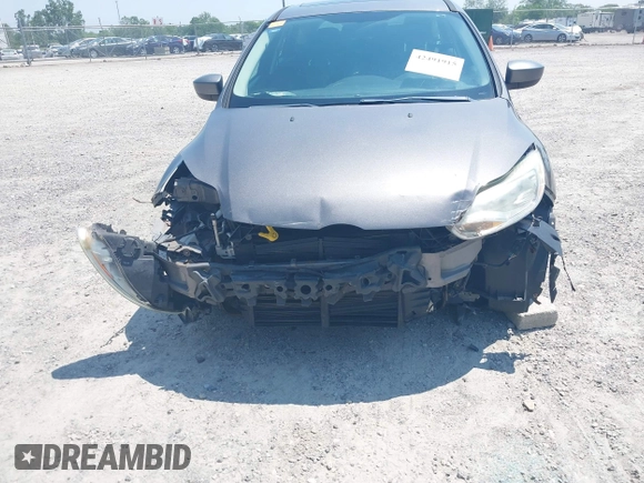 2012 Ford Focus SE z VIN 1FAHP3K28CL229646, wystawiony jako IAAI lot #42491915 z przebiegiem 174 105 mil mil oraz . Historia ofert i sprzedaży dostępna na DreamBid. Obrazek 6.