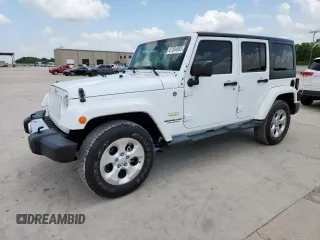 2014 Jeep Wrangler Unlimited Sahara z VIN 1C4BJWEG5EL309502, wystawiony jako Copart lot #61804885 z przebiegiem 60 683 mil mil oraz Szkoda całkowita • Salvage title. Historia ofert i sprzedaży dostępna na DreamBid. Obrazek 1.