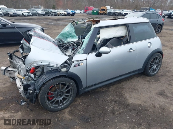 2006 MINI Hardtop S with VIN WMWRE33546TL23876, listed as a IAAI auction lot 41858060 with 146,359 mi miles and . Bid and sale history available at DreamBid. Image 2.