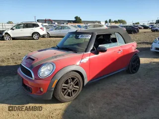 2014 MINI Convertible S with VIN WMWZP3C54ET298129, listed as a Copart auction lot 88523065 with 54,788 mi miles and Salvage Title. Bid and sale history available at DreamBid. Image 1.