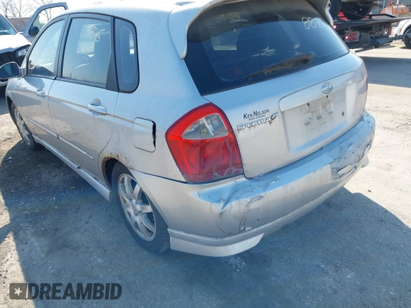 2006 Kia Spectra with VIN KNAFE161265317272, listed as a IAAI auction lot 42008875 with 169,983 mi miles. Bid and sale history available at carsss.com. Image 6.