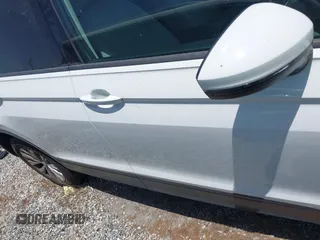 2018 Volkswagen Tiguan S with VIN 3VV1B7AX8JM032990, listed as a IAAI auction lot 42279807 with 74,185 mi miles and . Bid and sale history available at DreamBid. Image 14.