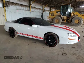 2001 Chevrolet Camaro Z28 z VIN 2G1FP22G612106148, wystawiony jako Copart lot #51154555 z przebiegiem 81 209 mil mil oraz Szkoda całkowita • Salvage title. Historia ofert i sprzedaży dostępna na DreamBid. Obrazek 4.
