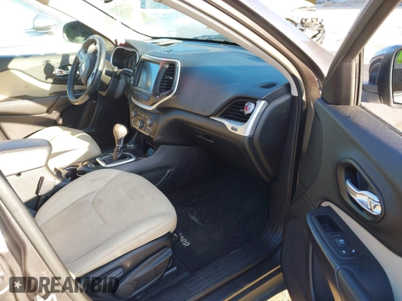 2015 Jeep Cherokee Latitude with VIN 1C4PJMCSXFW725644, listed as a IAAI auction lot 41312764 with 191,714 mi miles and . Bid and sale history available at DreamBid. Image 5.