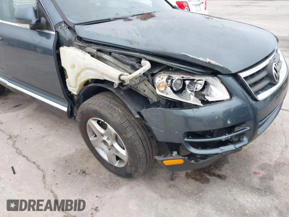 2007 Volkswagen Touareg V6 with VIN WVGZE77L97D011501, listed as a IAAI auction lot 41407720 with Not Provided miles and . Bid and sale history available at DreamBid. Image 6.