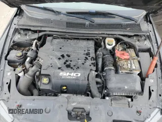2014 Ford Taurus SHO with VIN 1FAHP2KT4EG116744, listed as a Copart auction lot 44947915 with 138,757 mi miles and Clean Title. Bid and sale history available at carsss.com. Image 11.