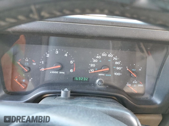 2003 Jeep Wrangler Sahara z VIN 1J4FA59S43P369233, wystawiony jako Copart lot #46517565 z przebiegiem 169 232 mil mil oraz Szkoda całkowita • Salvage title. Historia ofert i sprzedaży dostępna na DreamBid. Obrazek 9.