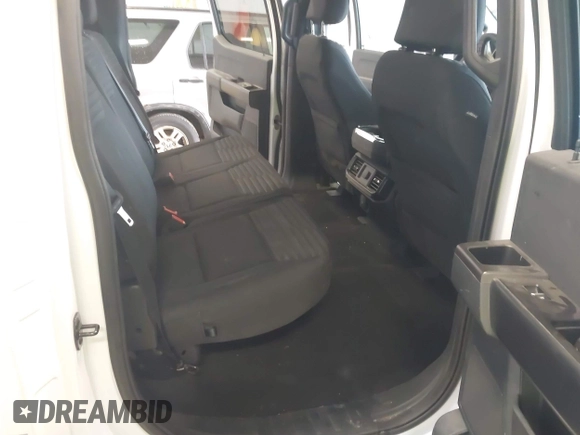 2022 Ford F-150 XL z VIN 1FTEW1EP1NKE50669, wystawiony jako IAAI lot #42294888 z przebiegiem 77 191 mil mil oraz . Historia ofert i sprzedaży dostępna na DreamBid. Obrazek 8.
