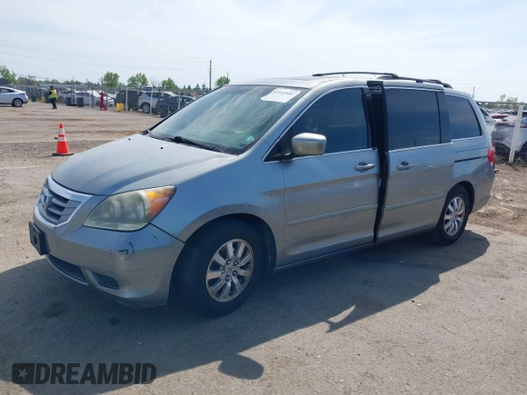 2009 Honda Odyssey EX-L with VIN 5FNRL387X9B055362, listed as a IAAI auction lot 42051881 with 139,172 mi miles and . Bid and sale history available at DreamBid. Image 2.