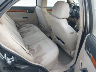 2009 Chevrolet Aveo LT w/1LT with VIN KL1TD56E09B626562, listed as a IAAI auction lot 41876182 with 108,496 mi miles. Bid and sale history available at carsss.com. Image 8.