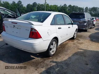 2005 Ford Focus S with VIN 1FAHP34N45W230950, listed as a IAAI auction lot 42467778 with 203,697 mi miles and . Bid and sale history available at DreamBid. Image 4.