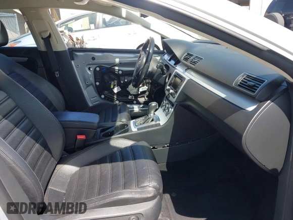 2014 Volkswagen CC R-Line with VIN WVWBP7AN0EE527649, listed as a IAAI auction lot 42009588 with 122,964 mi miles. Bid and sale history available at carsss.com. Image 5.