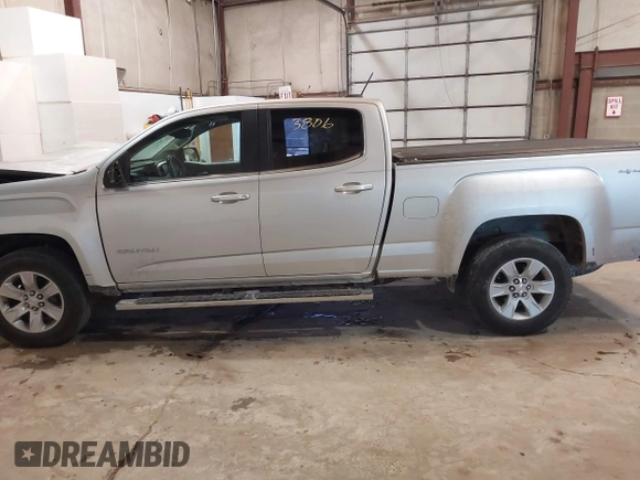 2015 GMC Canyon 4WD SLE with VIN 1GTG6BE36F1124627, listed as a IAAI auction lot 41623806 with 104,182 mi miles and . Bid and sale history available at carsss.com. Image 14.