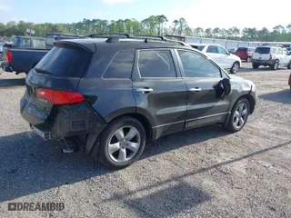 2007 Acura RDX Tech Pkg with VIN 5J8TB18567A023818, listed as a IAAI auction lot 41957412 with 168,144 mi miles. Bid and sale history available at carsss.com. Image 4.