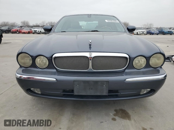 2004 Jaguar XJ with VIN SAJWA71C04SG22878, listed as a Copart auction lot 44383205 with 127,515 mi miles and Clean Title. Bid and sale history available at carsss.com. Image 5.