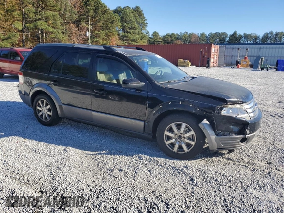 2008 Ford Taurus X SEL with VIN 1FMDK05W68GA33723, listed as a Copart auction lot 81121974 with 309,668 mi miles and Salvage Title. Bid and sale history available at DreamBid. Image 4.