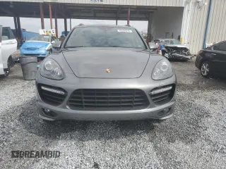 2014 Porsche Cayenne GTS с VIN WP1AD2A22ELA70950, выставлен на аукционе Copart как лот 48324015 с пробегом 75 310 миль миль и На запчасти • Non repairable. История ставок и продаж доступна на DreamBid. Изображение 5.