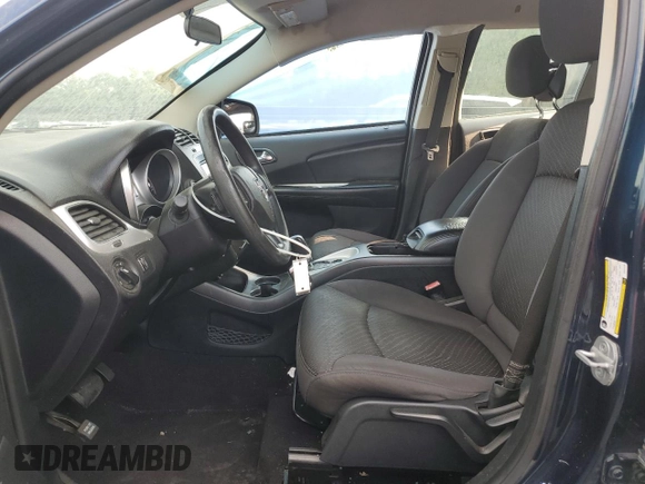 2013 Dodge Journey American Value with VIN 3C4PDCAB6DT577273, listed as a Copart auction lot 50627295 with 139,775 mi miles and Salvage title. Bid and sale history available at DreamBid. Image 7.