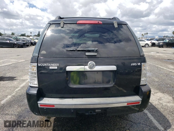 2006 Mercury Mountaineer Premier with VIN 4M2EU38806UJ13528, listed as a Copart auction lot 57497004 with 180,463 mi miles and Salvage Title. Bid and sale history available at carsss.com. Image 6.