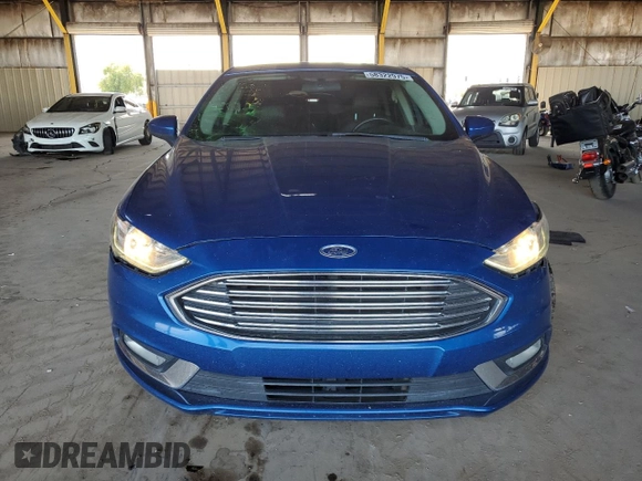 2017 Ford Fusion SE z VIN 3FA6P0H90HR157957, wystawiony jako Copart lot #58322975 z przebiegiem 114 128 mil mil oraz Szkoda całkowita • Salvage title. Historia ofert i sprzedaży dostępna na DreamBid. Obrazek 5.