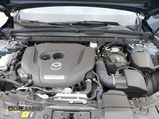 2024 Mazda CX-50 2.5 Turbo with VIN 7MMVABXY1RN237106, listed as a IAAI auction lot 42117311 with 3,135 mi miles and . Bid and sale history available at DreamBid. Image 10.
