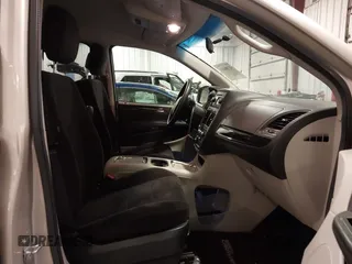 2013 Dodge Grand Caravan SXT with VIN 2C4RDGCG0DR567186, listed as a IAAI auction lot 41706119 with 112,512 mi miles and . Bid and sale history available at DreamBid. Image 5.