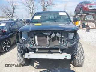 2010 Toyota Tacoma PreRunner with VIN 3TMJU4GN5AM100756, listed as a IAAI auction lot 41920188 with 90,776 mi miles and . Bid and sale history available at DreamBid. Image 6.