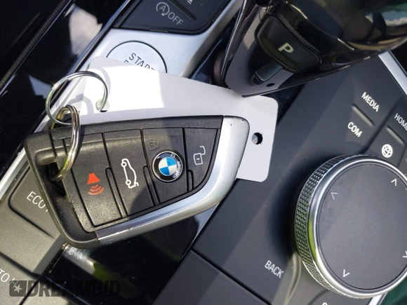 2021 BMW 2 Series 228i xDrive with VIN WBA73AK06M7G47198, listed as a IAAI auction lot 42169478 with 55,459 mi miles and . Bid and sale history available at DreamBid. Image 11.