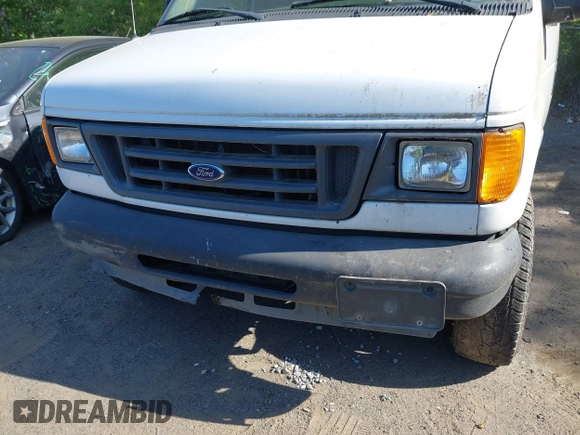2004 Ford Econoline Cargo Commercial with VIN 1FTNE24W04HA50342, listed as a IAAI auction lot 42145274 with 158,408 mi miles and . Bid and sale history available at carsss.com. Image 6.