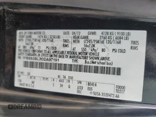 2012 Ford Econoline Passenger XL with VIN 1FBSS3BL3CDA97191, listed as a Copart auction lot 55284565 with 282,195 mi miles and Salvage title. Bid and sale history available at DreamBid. Image 13.
