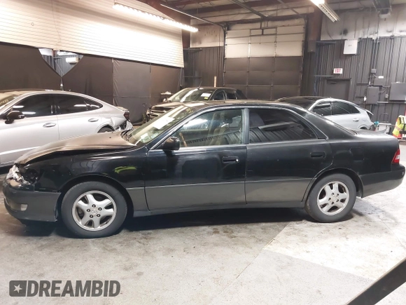 2001 Lexus ES 300 z VIN JT8BF28G415112517, wystawiony jako IAAI lot #42208849 z przebiegiem 202 029 mil mil oraz . Historia ofert i sprzedaży dostępna na DreamBid. Obrazek 14.