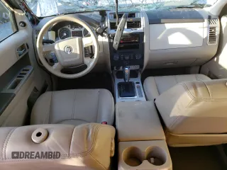 2009 Mercury Mariner Premier z VIN 4M2CU87789KJ23933, wystawiony jako Copart lot #45120455 z przebiegiem 104 465 mil mil oraz Szkody całkowita. Historia ofert i sprzedaży dostępna na DreamBid. Obrazek 8.