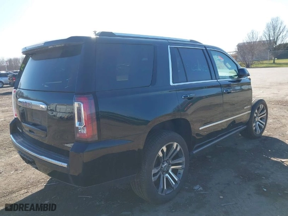 2018 GMC Yukon Denali with VIN 1GKS2CKJ3JR281853, listed as a IAAI auction lot 41946294 with 125,622 mi miles. Bid and sale history available at carsss.com. Image 4.