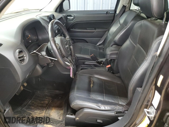 2014 Jeep Patriot High Altitude z VIN 1C4NJPFA4ED813336, wystawiony jako Copart lot #54747055 z przebiegiem 144 000 mil mil oraz Szkoda całkowita • Salvage title. Historia ofert i sprzedaży dostępna na DreamBid. Obrazek 7.