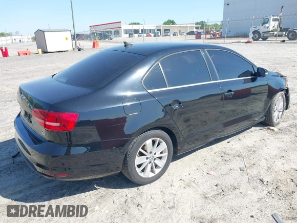 2015 Volkswagen Jetta SE with VIN 3VWD17AJ3FM301301, listed as a IAAI auction lot 41998475 with 98,407 mi miles and . Bid and sale history available at DreamBid. Image 4.