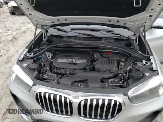 2020 BMW X1 xDrive28i with VIN WBXJG9C05L5P76067, listed as a Copart auction lot 40635893 with 57,184 mi miles. Bid and sale history available at carsss.com. Image 12.