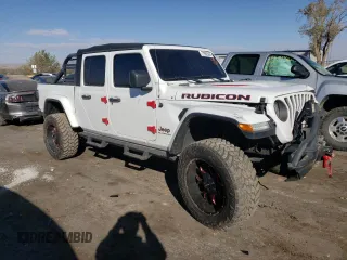 2020 Jeep Gladiator Rubicon with VIN 1C6JJTBG7LL152204, listed as a Copart auction lot 83525554 with 7,030 mi miles and Salvage title. Bid and sale history available at DreamBid. Image 4.