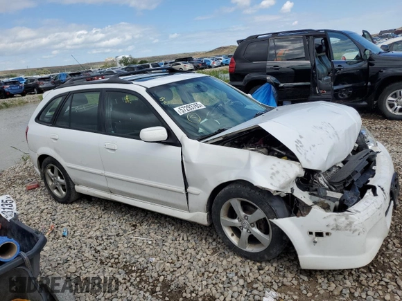 2002 Mazda Protege z VIN JM1BJ245721470434, wystawiony jako Copart lot #57293765 z przebiegiem 144 622 mil mil oraz Szkoda całkowita • Salvage title. Historia ofert i sprzedaży dostępna na DreamBid. Obrazek 4.