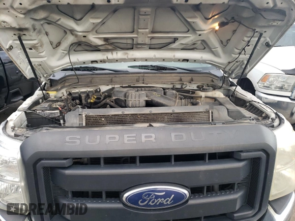 2014 Ford F-250 XL with VIN 1FTBF2A6XEEB42193, listed as a Copart auction lot 81949654 with 157,687 mi miles and Salvage title. Bid and sale history available at DreamBid. Image 11.