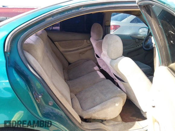 1999 Oldsmobile Alero GL z VIN 1G3NL52T0XC354966, wystawiony jako IAAI lot #42259258 z przebiegiem Nie podano mil oraz . Historia ofert i sprzedaży dostępna na DreamBid. Obrazek 8.