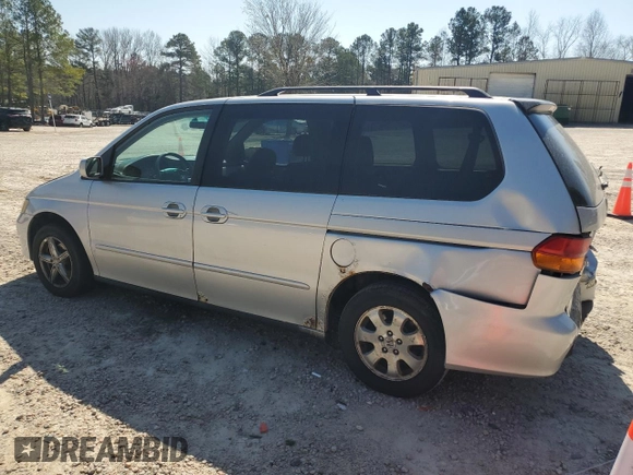2004 Honda Odyssey EX-L with VIN 5FNRL18974B074613, listed as a Copart auction lot 48924865 with 212,633 mi miles and Salvage Title. Bid and sale history available at DreamBid. Image 2.