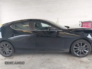 2019 Mazda Mazda3 Hatchback with VIN JM1BPBJM1K1134076, listed as a IAAI auction lot 41643876 with 69,641 mi miles. Bid and sale history available at carsss.com. Image 13.