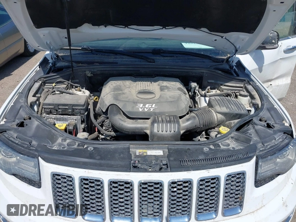 2014 Jeep Grand Cherokee Summit z VIN 1C4RJFJG3EC213145, wystawiony jako IAAI lot #41918145 z przebiegiem 176 460 mil mil oraz . Historia ofert i sprzedaży dostępna na DreamBid. Obrazek 10.