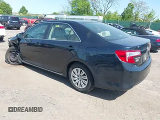 2012 Toyota Camry L with VIN 4T1BF1FK0CU599819, listed as a IAAI auction lot 42158719 with 130,038 mi miles. Bid and sale history available at carsss.com. Image 3.