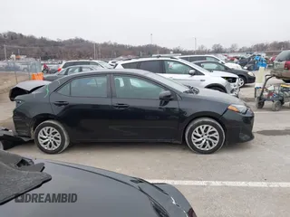 2019 Toyota Corolla L with VIN 5YFBURHE5KP945925, listed as a IAAI auction lot 41493079 with 96,849 mi miles and . Bid and sale history available at carsss.com. Image 14.