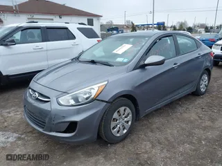 2015 Hyundai Accent GLS with VIN KMHCT4AE0FU929088, listed as a IAAI auction lot 41993359 with 149,958 mi miles. Bid and sale history available at carsss.com. Image 2.