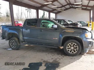 2015 GMC Canyon 2WD SLE with VIN 1GTG5BE37F1265497, listed as a IAAI auction lot 41507236 with 101,385 mi miles. Bid and sale history available at carsss.com. Image 14.