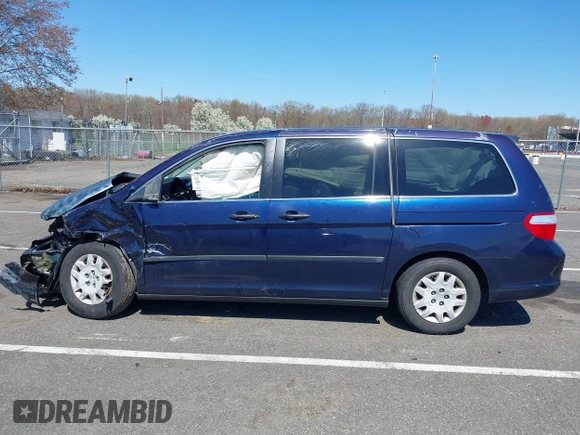 2007 Honda Odyssey LX with VIN 5FNRL38277B098798, listed as a IAAI auction lot 41998802 with 205,657 mi miles and . Bid and sale history available at carsss.com. Image 14.