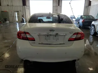 2014 Infiniti Q70 z VIN JN1BY1AR9EM320070, wystawiony jako Copart lot #56855645 z przebiegiem 164 599 mil mil oraz Nie do naprawy. Historia ofert i sprzedaży dostępna na DreamBid. Obrazek 6.